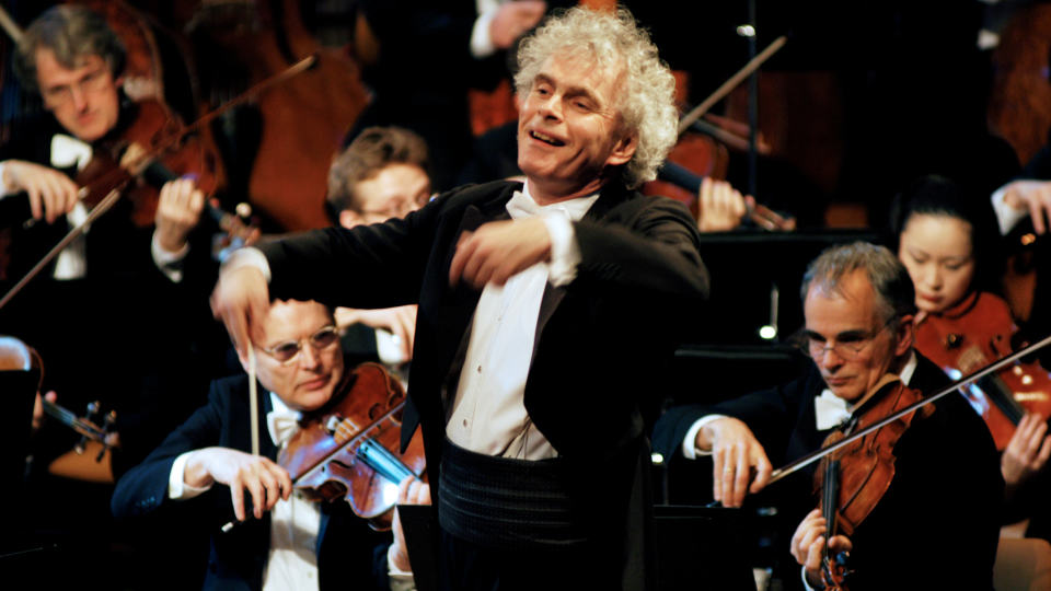 Sir Simon Rattle conducts “Carmina Burana” at the 2004 New Year’s Eve ...